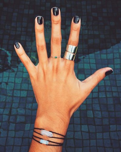 Short, black nails.  It's either something really short or dramatic coffin nails.  There's no In between: